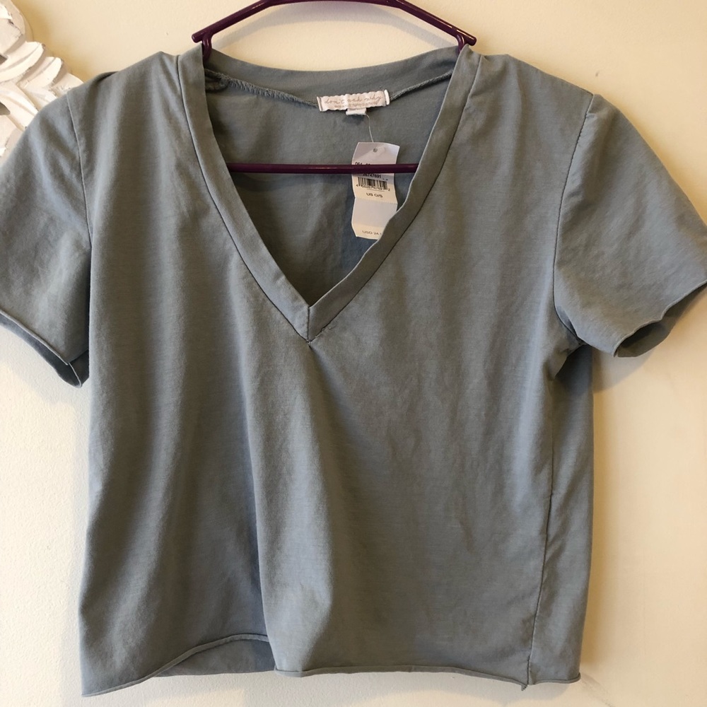 Two cropped vneck “don’t ask why” T-shirts